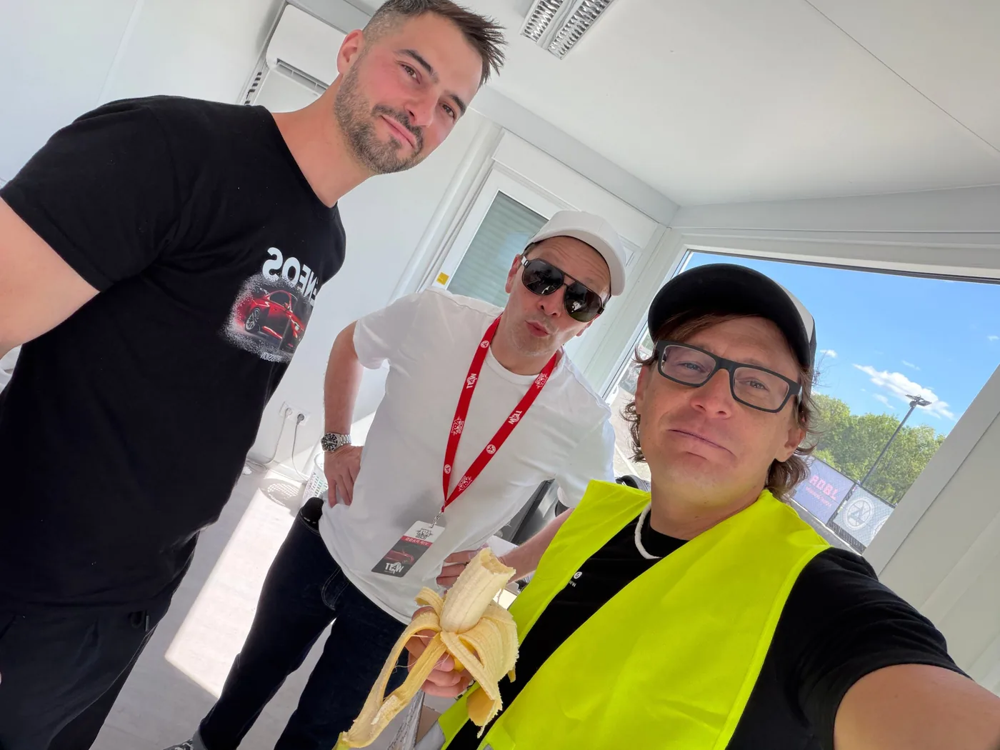 Behind the scenes in the organisers' office: Áron Bacsa on the left, Péter Janklovics in the middle, photographer Gábor Tokodi on the right with a banana